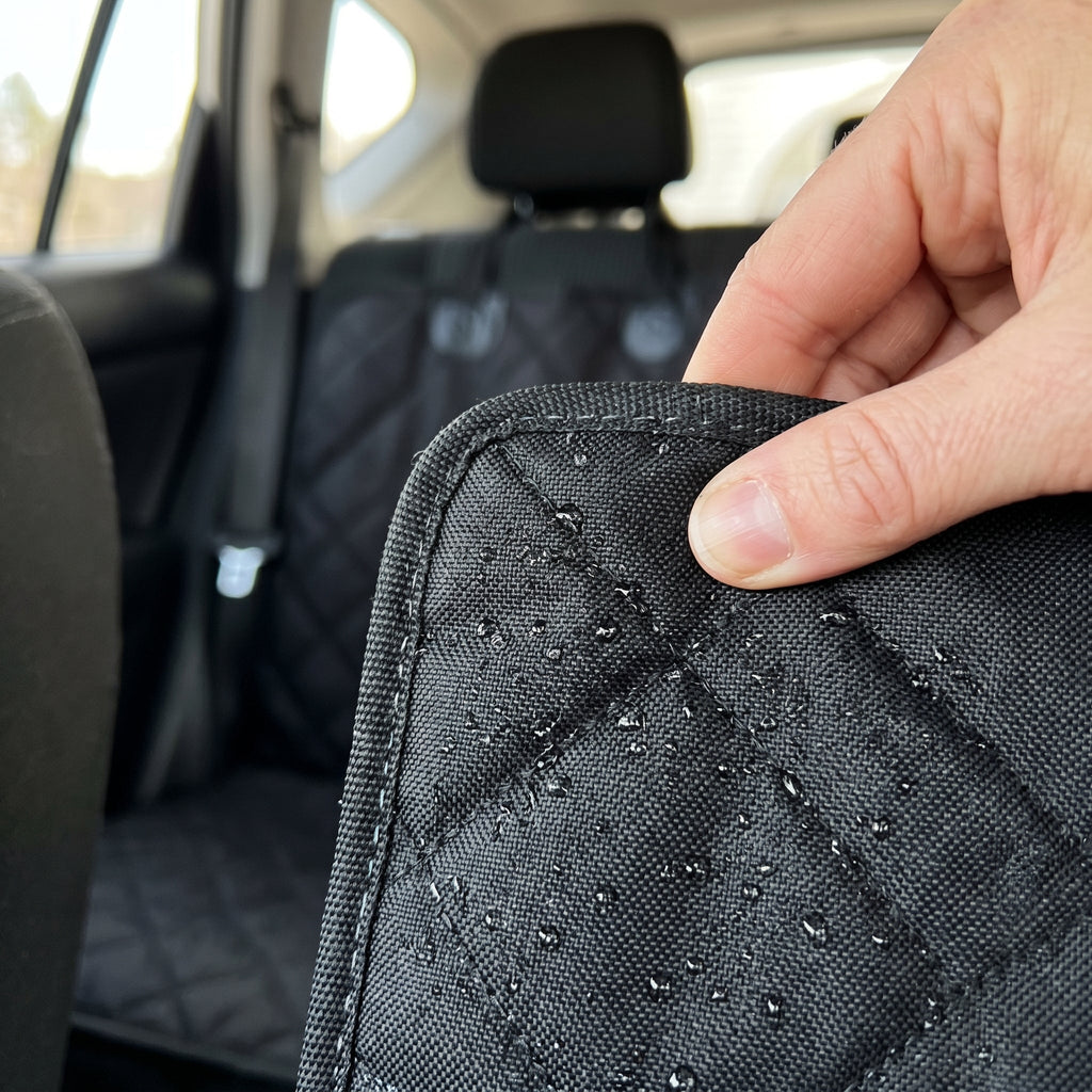 Close-up of water beading on RoadWag waterproof dog seat cover fabric